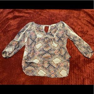 Lady’s dress blouse with V neckline.